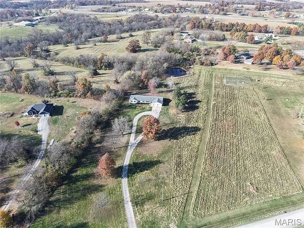 5 Acres of Residential Land with Home for Sale in New London, Missouri