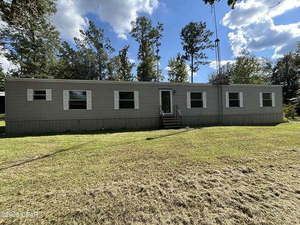 1.5 Acres of Residential Land with Home for Sale in Marianna, Florida