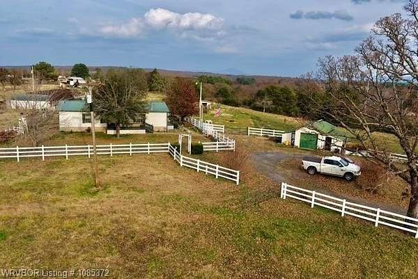 10 Acres of Land with Home for Sale in Wister, Oklahoma