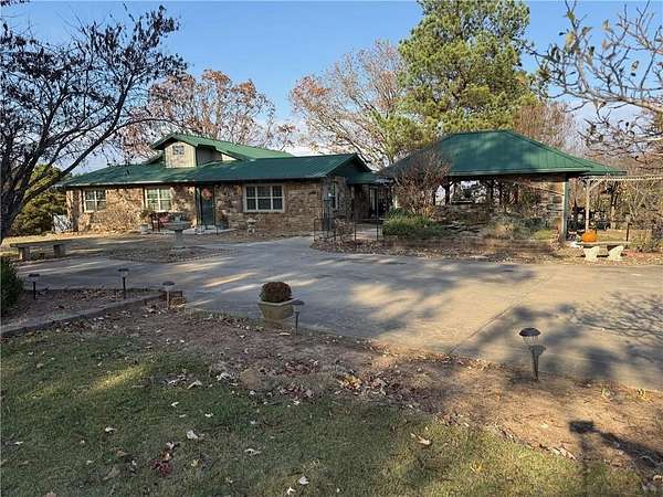 8.4 Acres of Residential Land with Home for Sale in Ozark, Arkansas