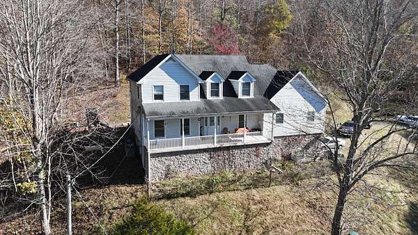 27.8 Acres of Recreational Land with Home for Auction in Lafayette, Tennessee