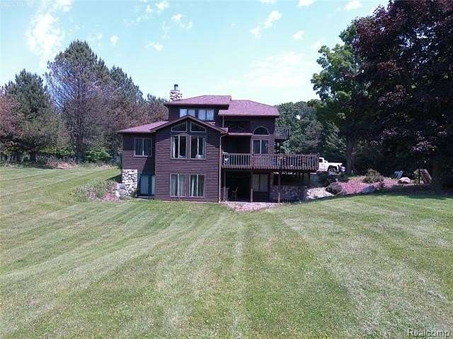 2.29 Acres of Residential Land with Home for Sale in Fenton, Michigan