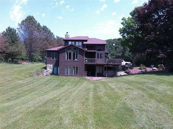 2.29 Acres of Residential Land with Home for Sale in Fenton, Michigan