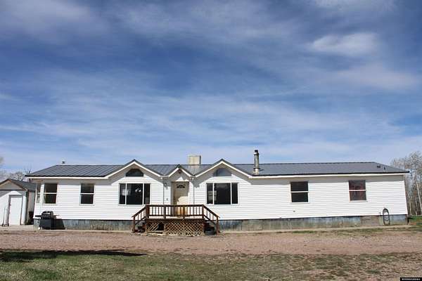 8.56 Acres of Land with Home for Sale in Robertson, Wyoming