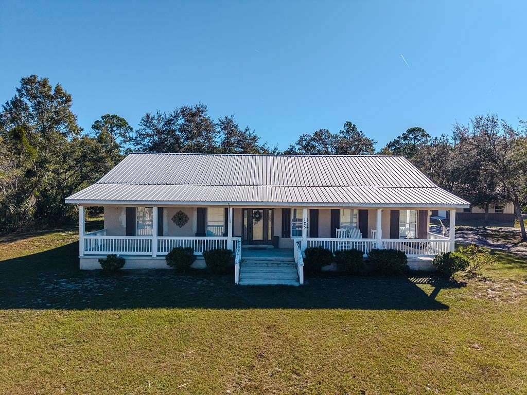 7.57 Acres of Land with Home for Sale in Horseshoe Beach, Florida