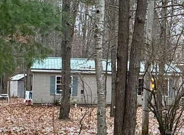 10 Acres of Residential Land with Home for Sale in Beaverton, Michigan