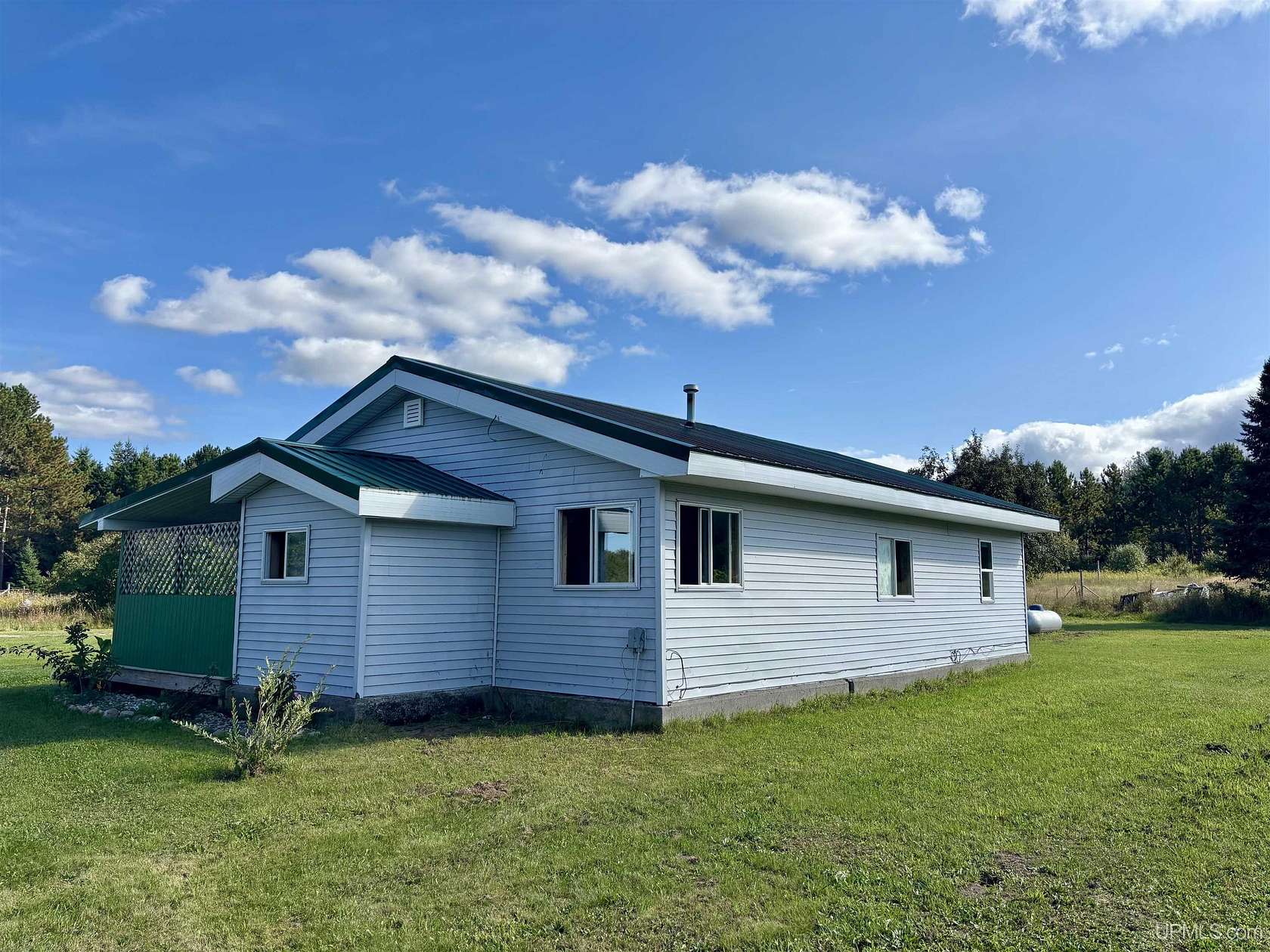 13.6 Acres of Land with Home for Sale in McMillan, Michigan