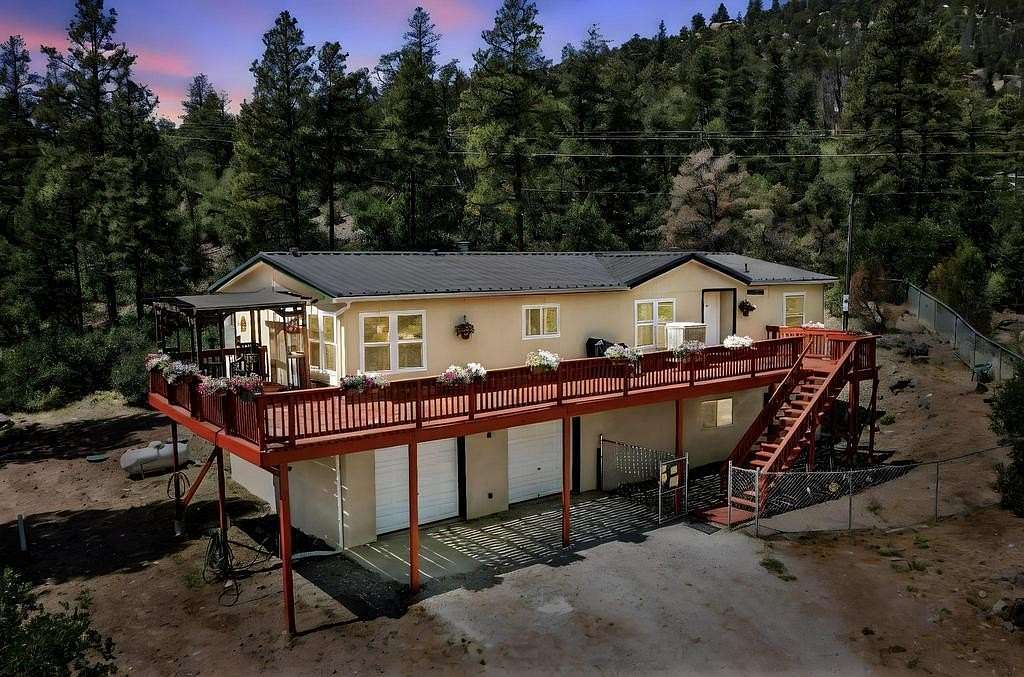 3.3 Acres of Residential Land with Home for Sale in Jemez Springs, New Mexico