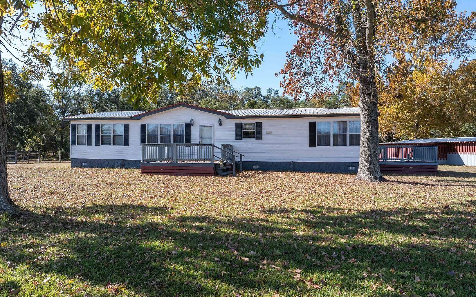 10 Acres of Residential Land with Home for Sale in Live Oak, Florida