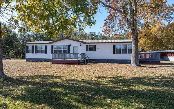 10 Acres of Residential Land with Home for Sale in Live Oak, Florida