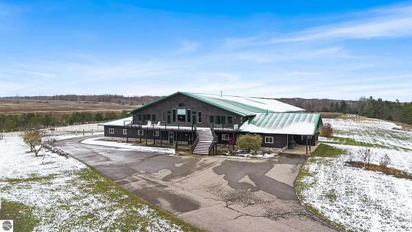 180 Acres of Land with Home for Sale in East Jordan, Michigan