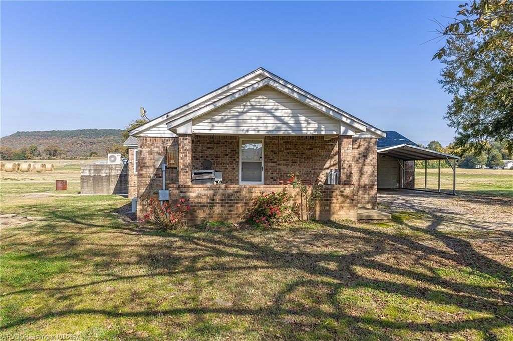 22.6 Acres of Land with Home for Sale in Paris, Arkansas