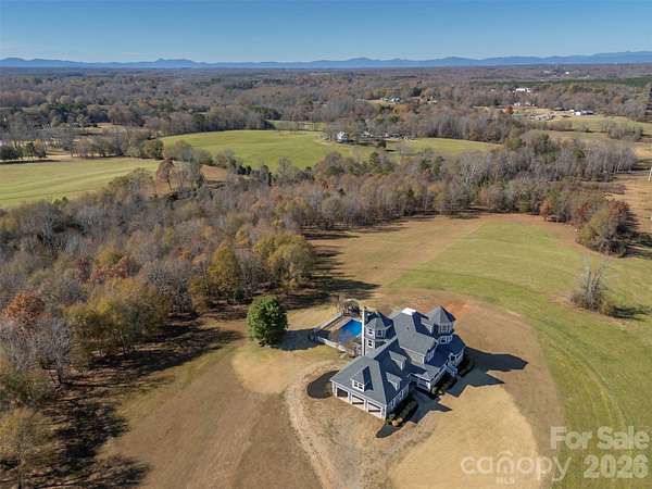 10.3 Acres of Land with Home for Sale in Forest City, North Carolina