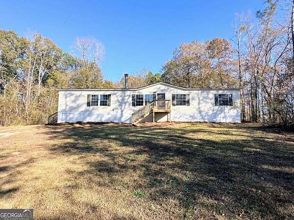 4.6 Acres of Residential Land with Home for Sale in Talladega, Alabama