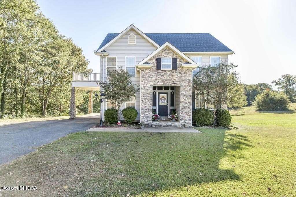 24.9 Acres of Land with Home for Sale in Forsyth, Georgia