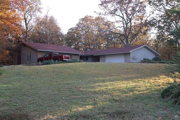 4.82 Acres of Residential Land with Home for Sale in Dexter, Missouri