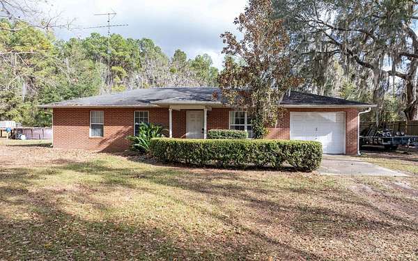 147 Acres of Land with Home for Sale in Wellborn, Florida