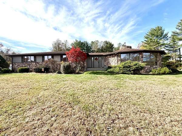 10.5 Acres of Land with Home for Auction in Buckhannon, West Virginia