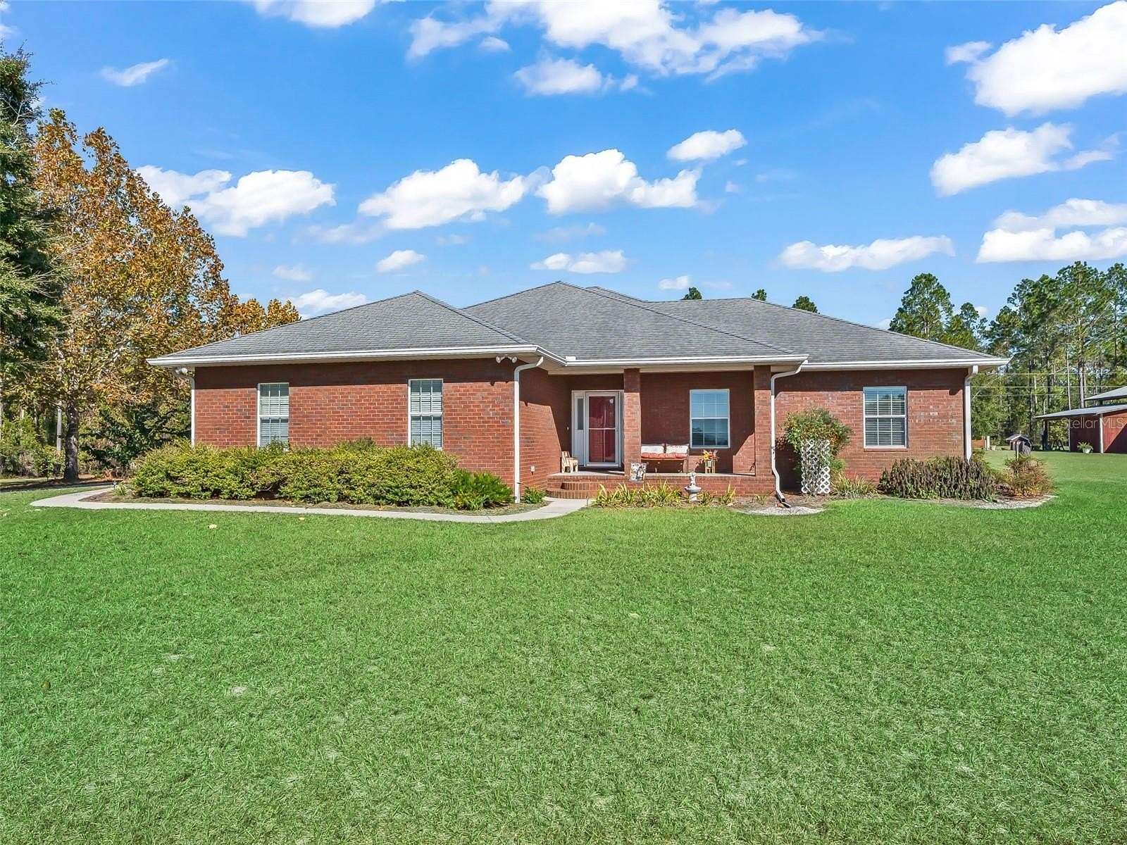 20.2 Acres of Agricultural Land with Home for Sale in Chiefland, Florida