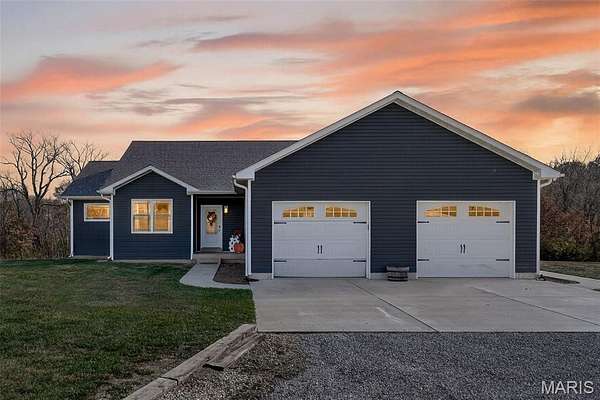 5 Acres of Residential Land with Home for Sale in Clarksville, Missouri