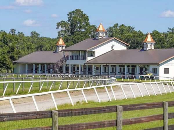 92 Acres of Agricultural Land with Home for Sale in Citra, Florida