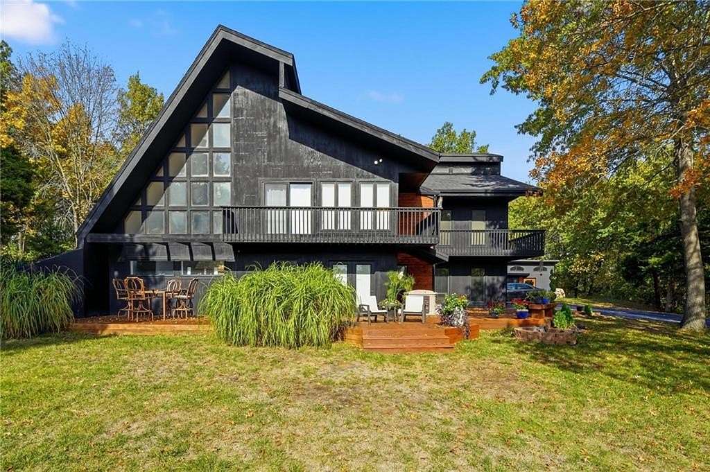 4.82 Acres of Residential Land with Home for Sale in Blue Springs, Missouri