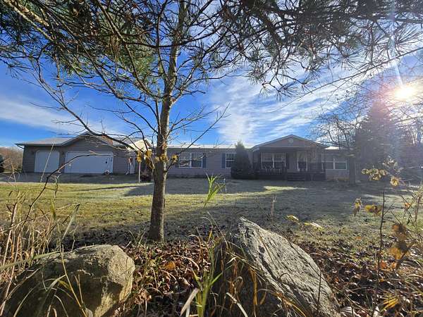 20 Acres of Land with Home for Sale in Fairview, Michigan