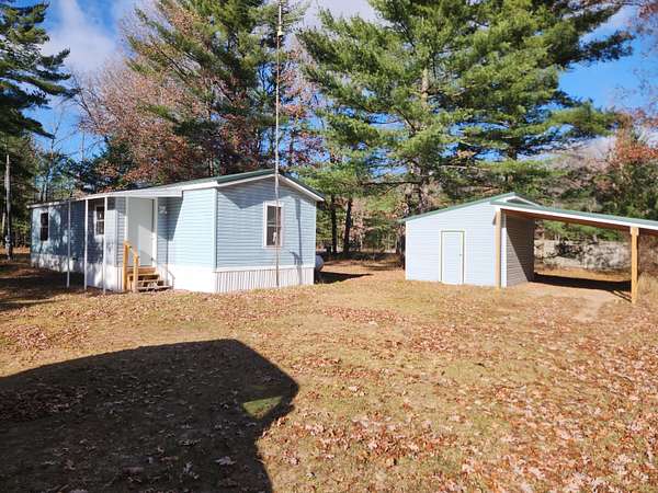 4.89 Acres of Residential Land with Home for Sale in Baldwin, Michigan