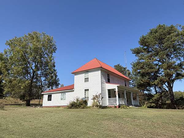 4 Acres of Residential Land with Home for Sale in McKenzie, Tennessee