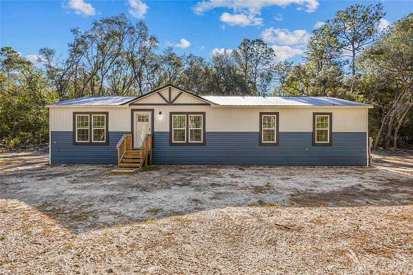 2 Acres of Residential Land with Home for Sale in Keystone Heights, Florida