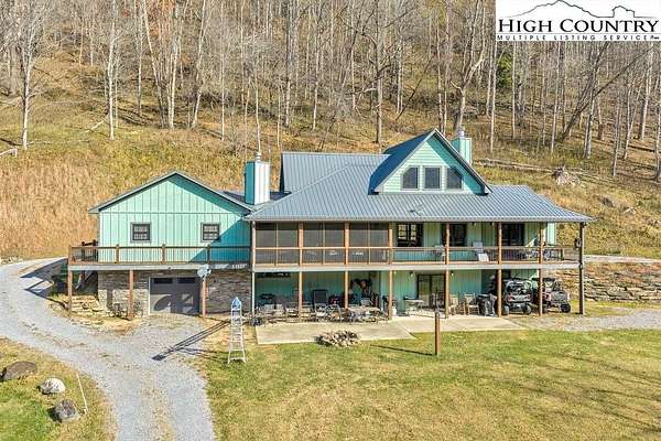 14.6 Acres of Land with Home for Sale in Roan Mountain, Tennessee