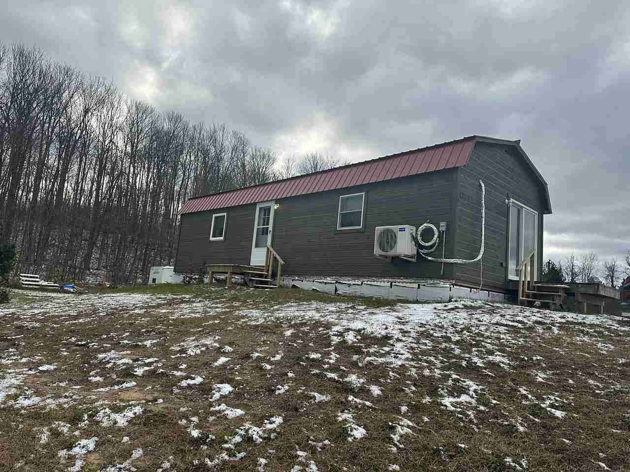 10 Acres of Recreational Land with Home for Sale in Pellston, Michigan