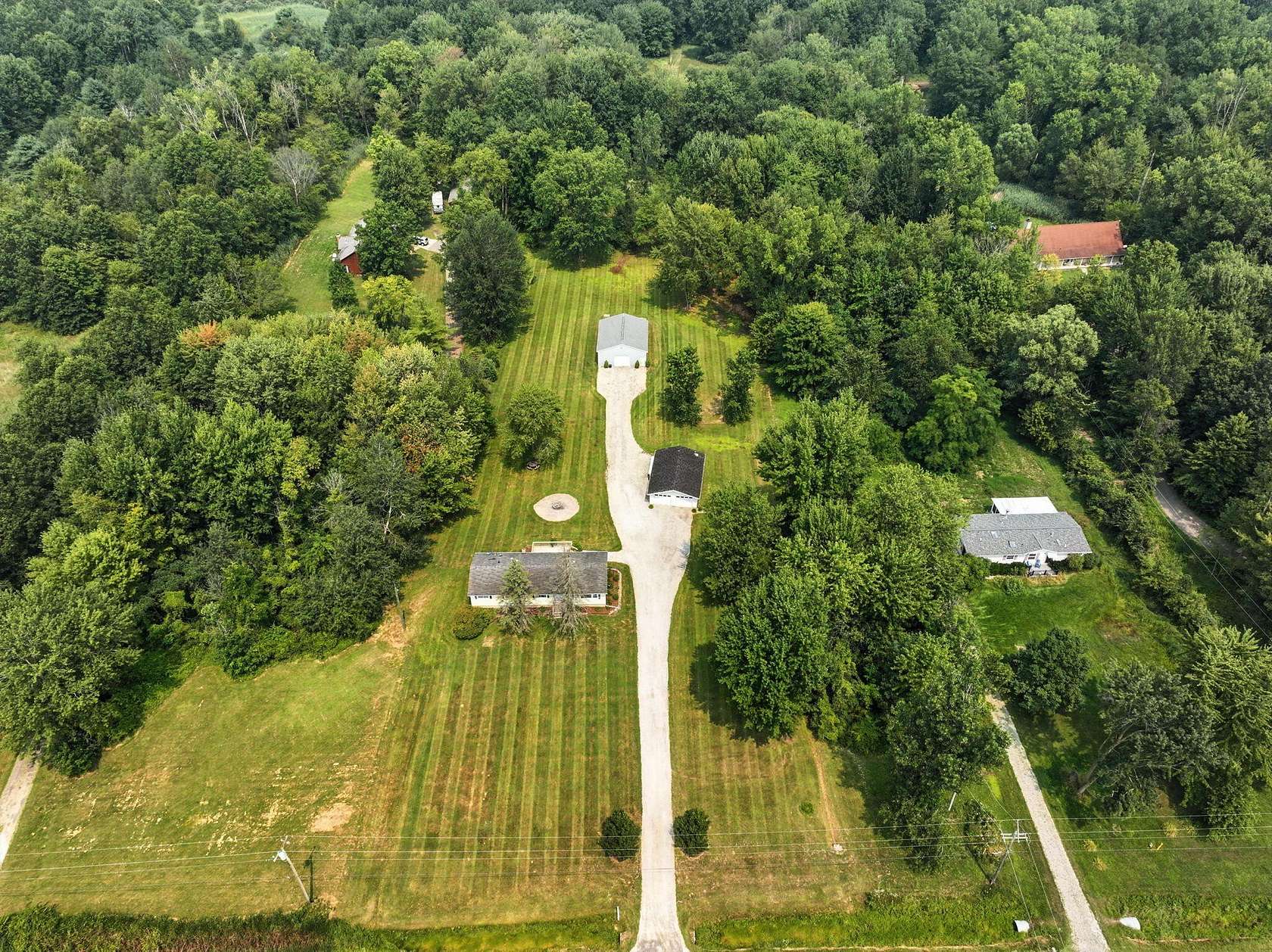 10 Acres of Land with Home for Sale in Casco, Michigan