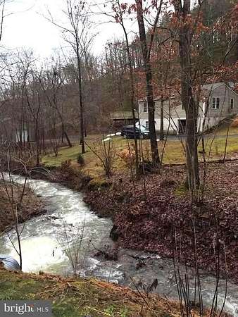 25.6 Acres of Land with Home for Sale in Springfield, West Virginia