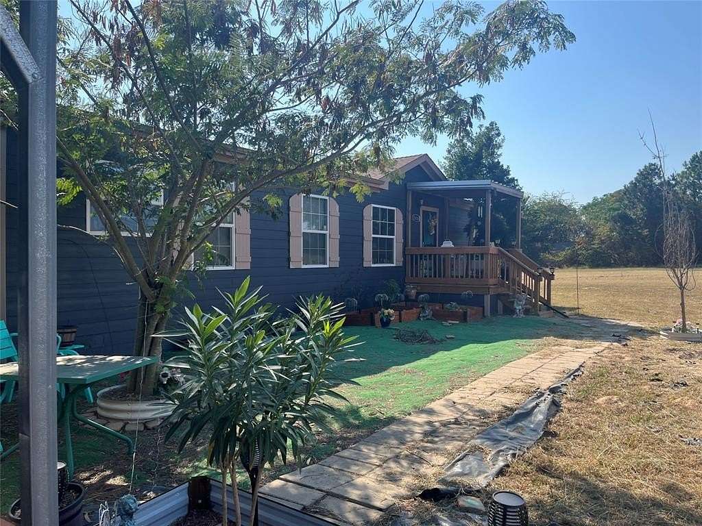 2 Acres of Residential Land with Home for Sale in Quitman, Texas