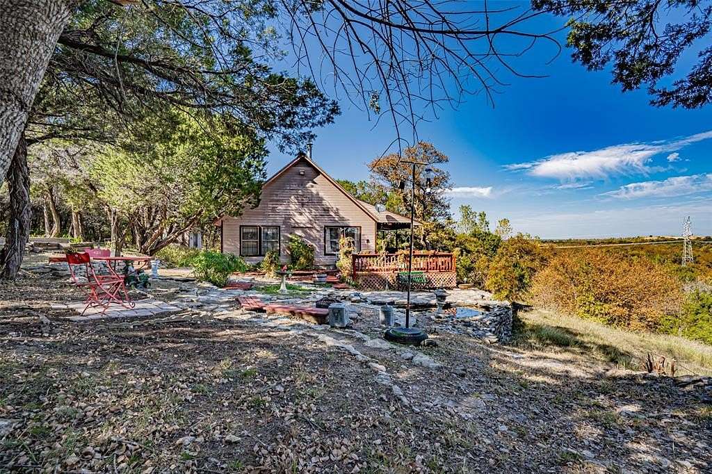 5.1 Acres of Residential Land with Home for Sale in Rainbow, Texas