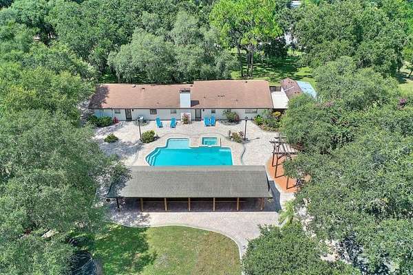 4.17 Acres of Residential Land with Home for Sale in Haines City, Florida