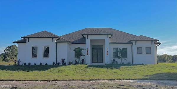 2.27 Acres of Residential Land with Home for Sale in Naples, Florida