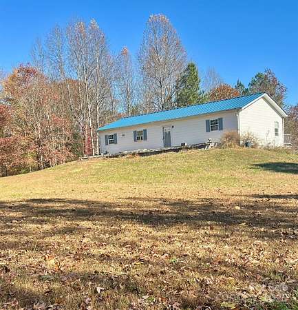 10 Acres of Residential Land with Home for Sale in Olin, North Carolina