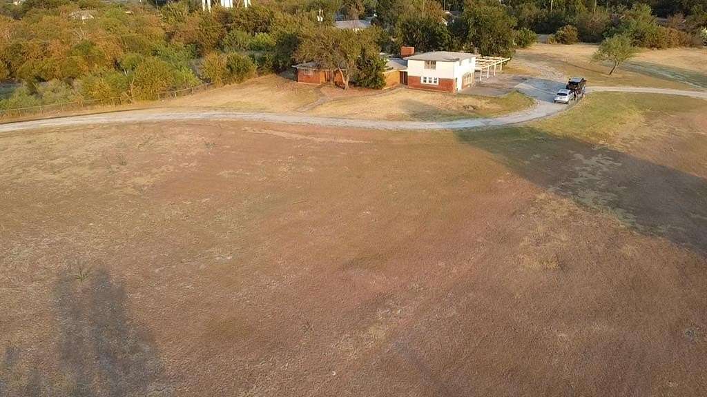 4.45 Acres of Residential Land with Home for Sale in Jacksboro, Texas