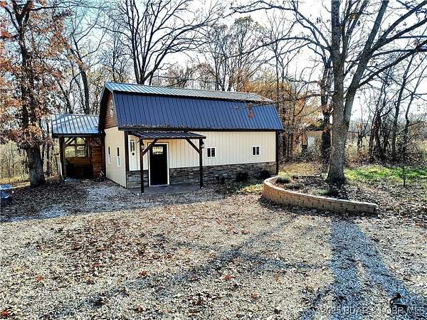 10 Acres of Land with Home for Sale in Barnett, Missouri