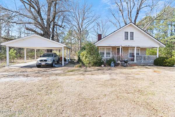 21.4 Acres of Land with Home for Sale in Rockingham, North Carolina