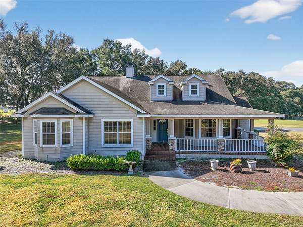 9 Acres of Land with Home for Sale in Oxford, Florida