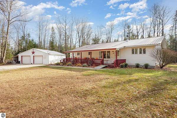 10.6 Acres of Recreational Land with Home for Sale in Barton City, Michigan