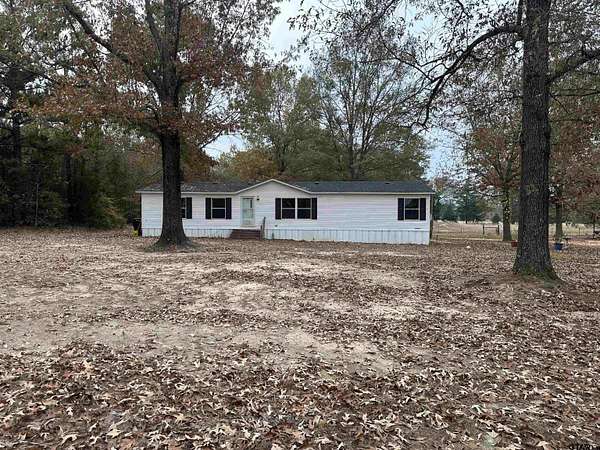 8.7 Acres of Residential Land with Home for Sale in Gilmer, Texas