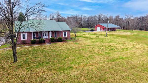 8.83 Acres of Land with Home for Sale in Vanleer, Tennessee