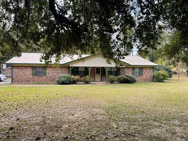 7 Acres of Residential Land with Home for Sale in Harrisonburg, Louisiana