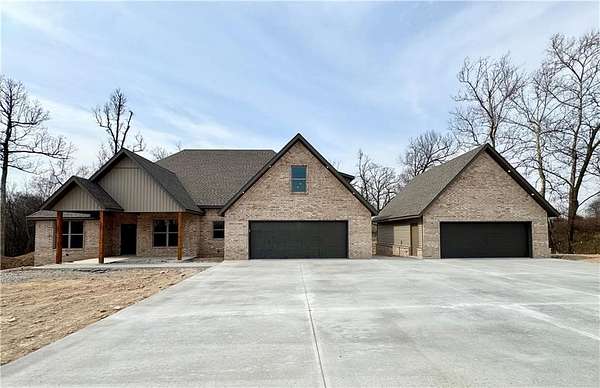 1.78 Acres of Land with Home for Sale in Gentry, Arkansas