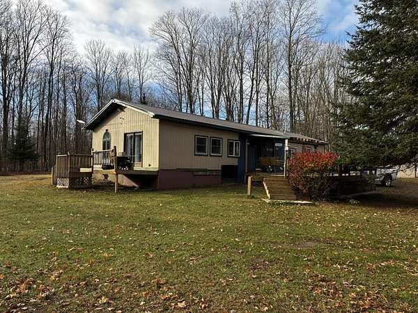 16 Acres of Land with Home for Sale in McMillan, Michigan