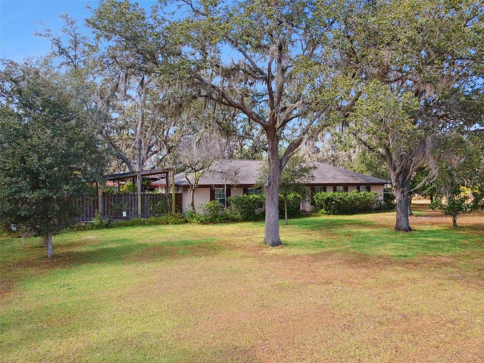 5 Acres of Land with Home for Sale in Zephyrhills, Florida